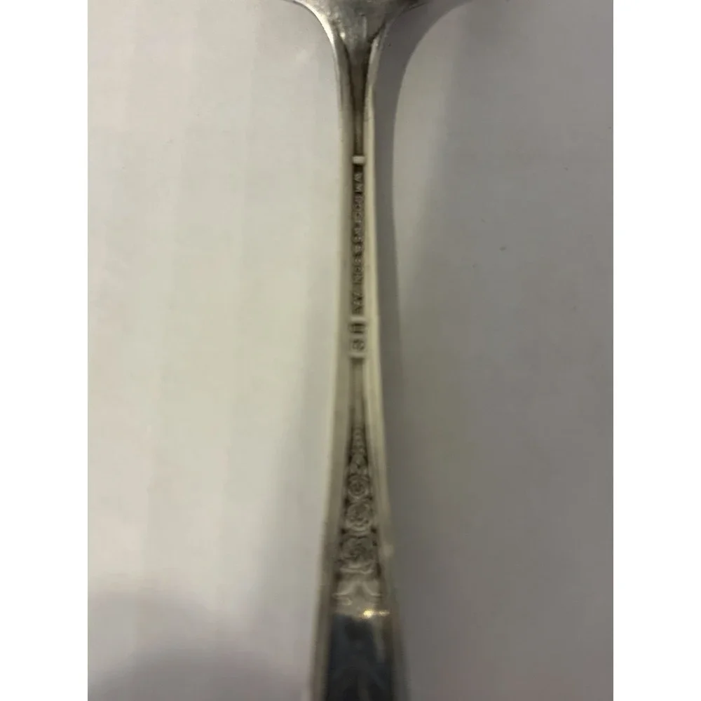 Wm. A Rogers Silver Plated Spoon Floral Decorative Handle Glossy Silver 6 in